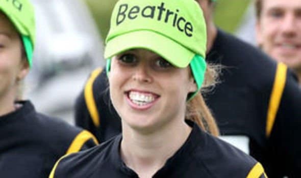 Science to Slam. Image of Princess Beatrice weraing a green baseball cap