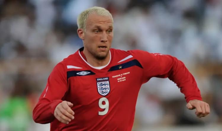 Science to Slam. Image of a Dean Ashton in England Football kit