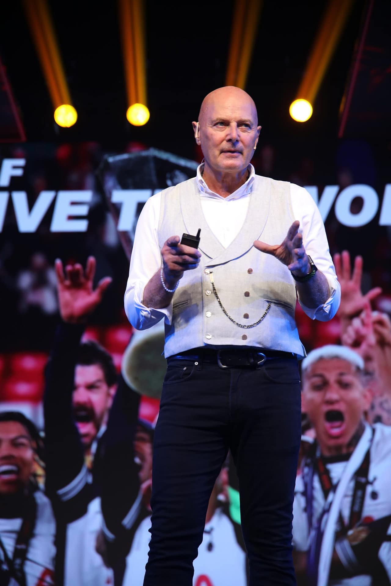 Roberto Forzoni delivering a keynote on stage